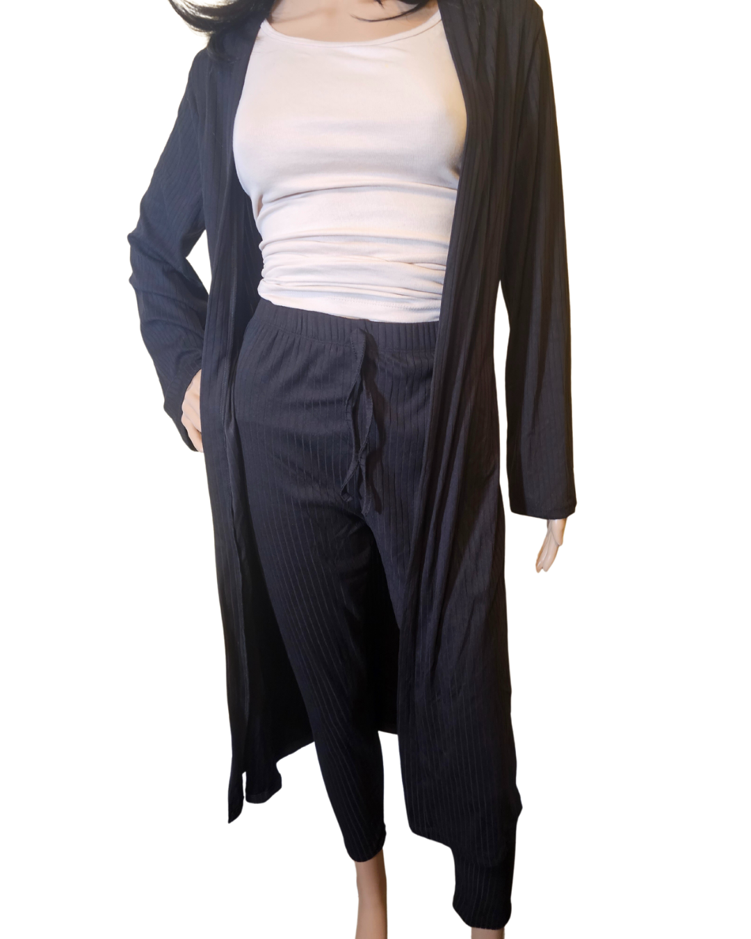 Small-Large in size. black 2 pc cardigan set. the pants are legging pants with a decorative string in the front.