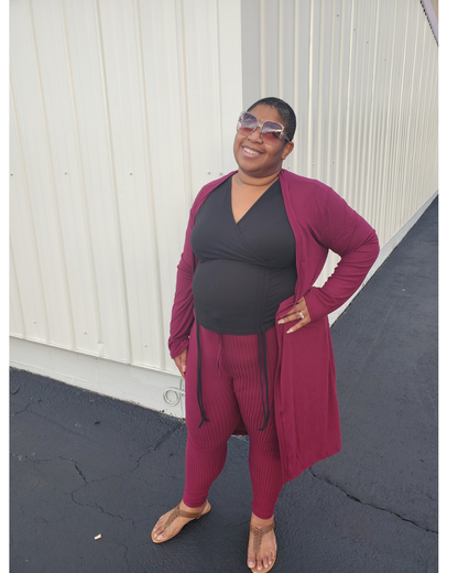 image of women wearing 3 pc cardigan burgundy set along with the clear sunglasses. the perfect match