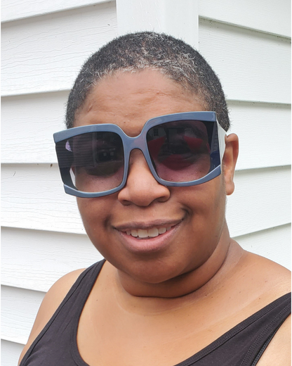 image of women wearing gray pair of shades