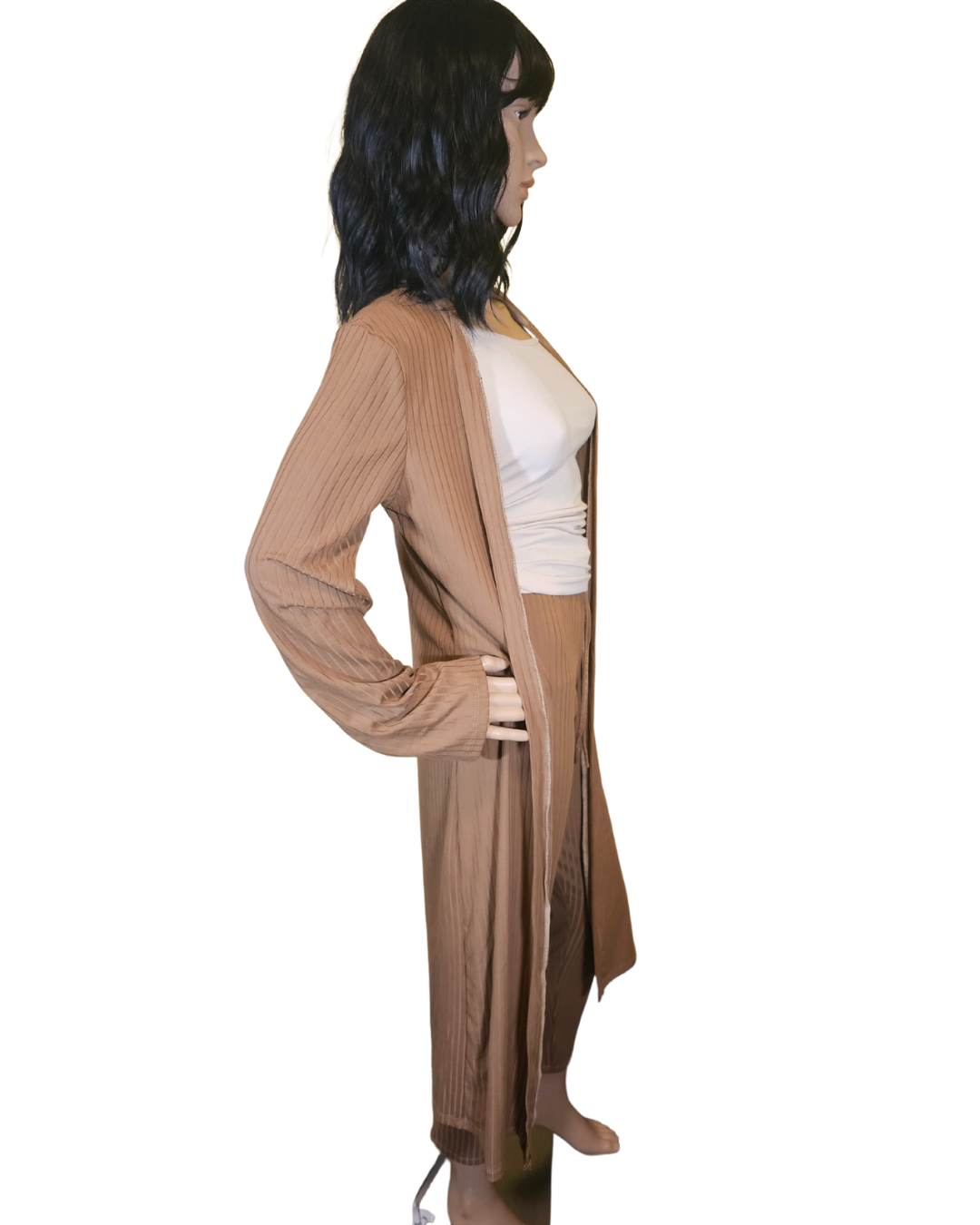 Small-Large in size. tan 2 pc cardigan set. the pants are legging pants with a decorative string in the front.