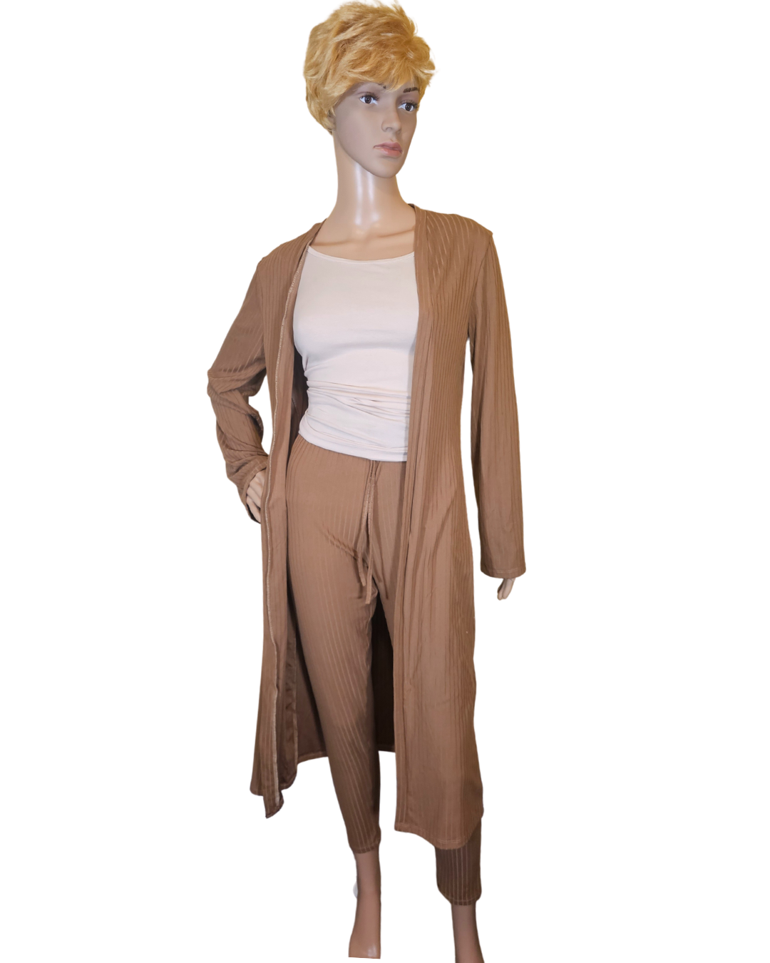 Small-Large in size. tan 2 pc cardigan set. the pants are legging pants with a decorative string in the front.