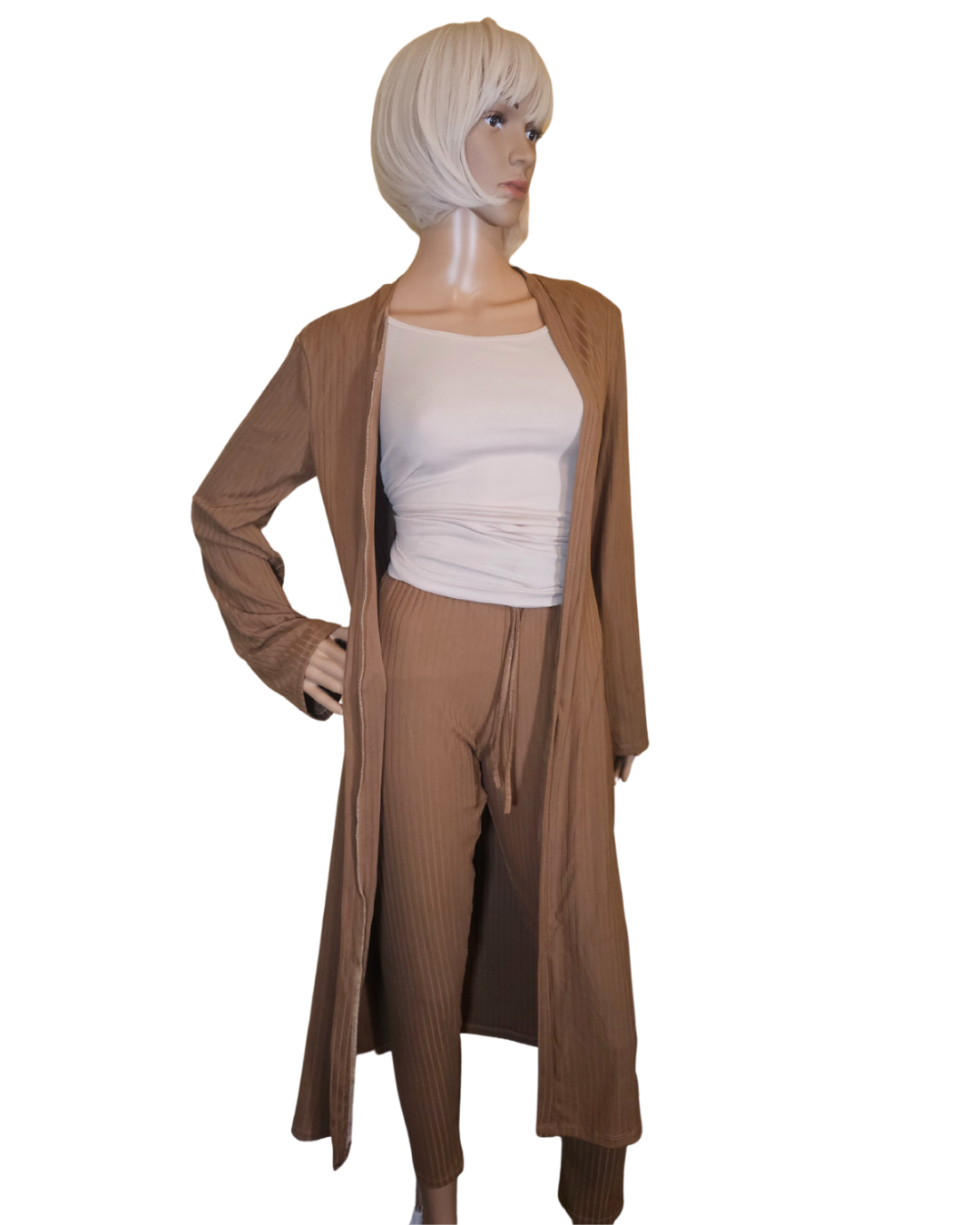 Small-Large in size. tan 2 pc cardigan set. the pants are legging pants with a decorative string in the front.