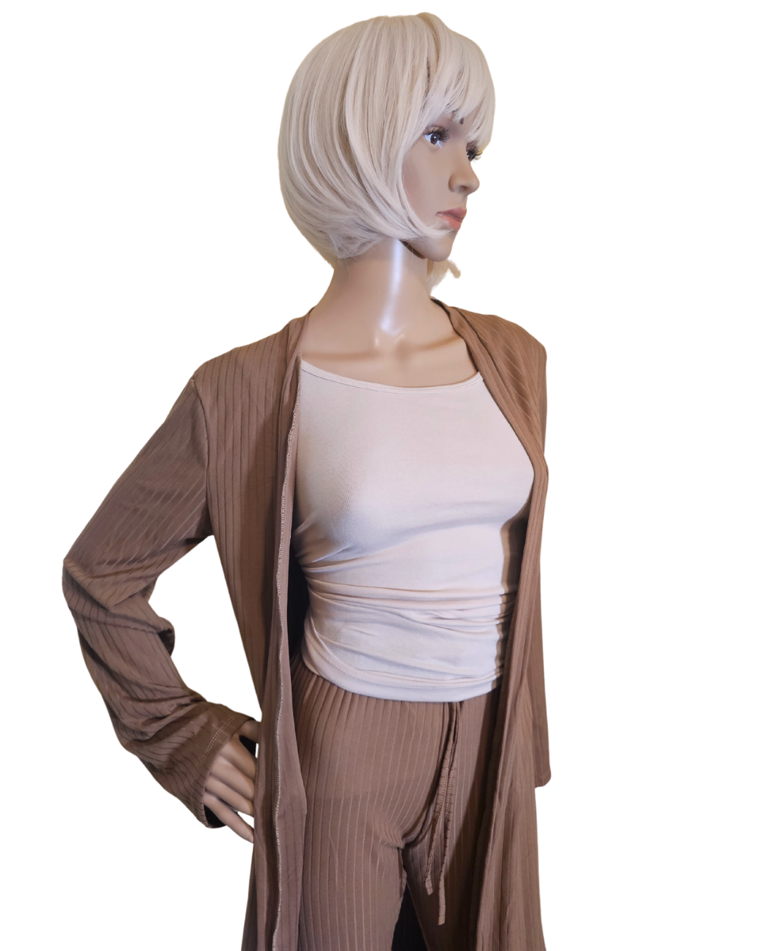 Small-Large in size. tan 2 pc cardigan set. the pants are legging pants with a decorative string in the front.