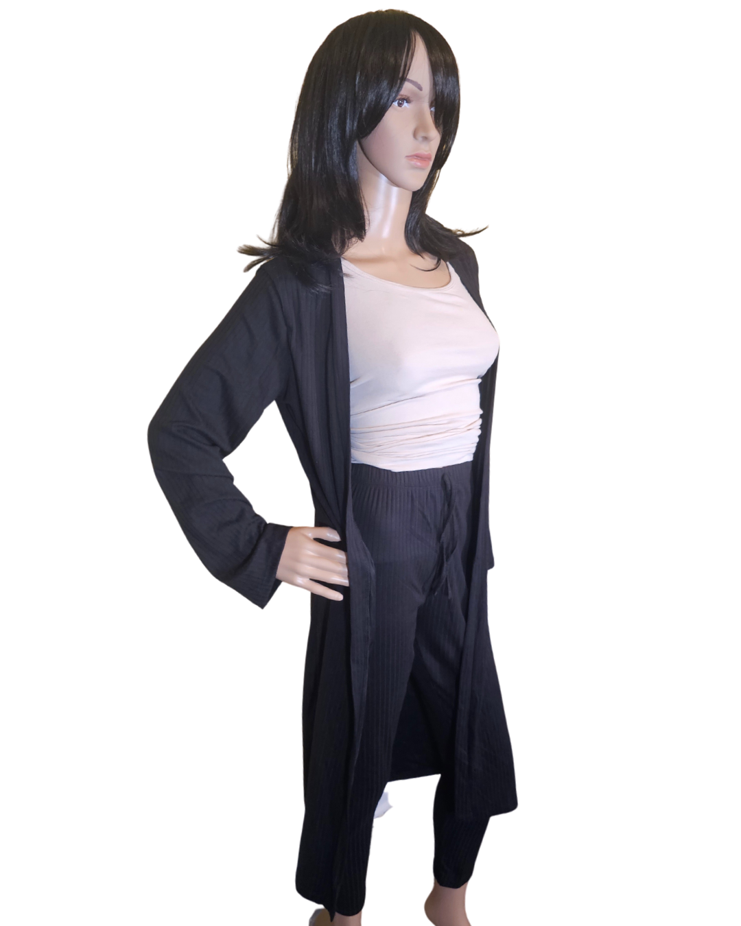 Small-Large in size. black 2 pc cardigan set. the pants are legging pants with a decorative string in the front.