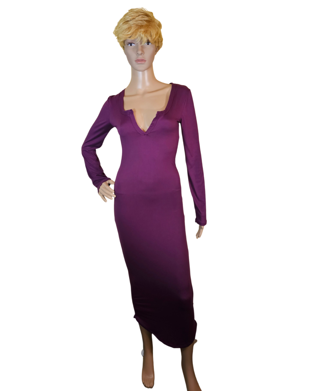 small-large, purple soft material dress that fits your curves and has a v-neck in the front. the dress goes pass your knees. long sleeves