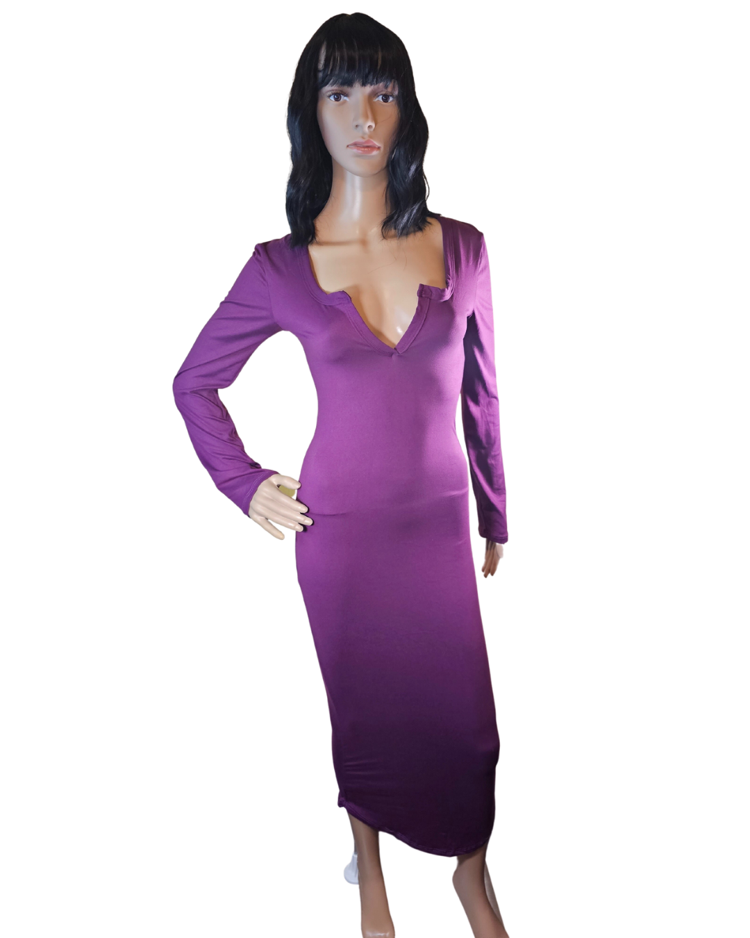 small-large, purple soft material dress that fits your curves and has a v-neck in the front. the dress goes pass your knees. long sleeves