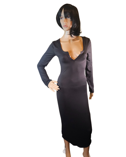 small-large, black soft material dress that fits your curves and has a v-neck in the front. the dress goes pass your knees. long sleeves