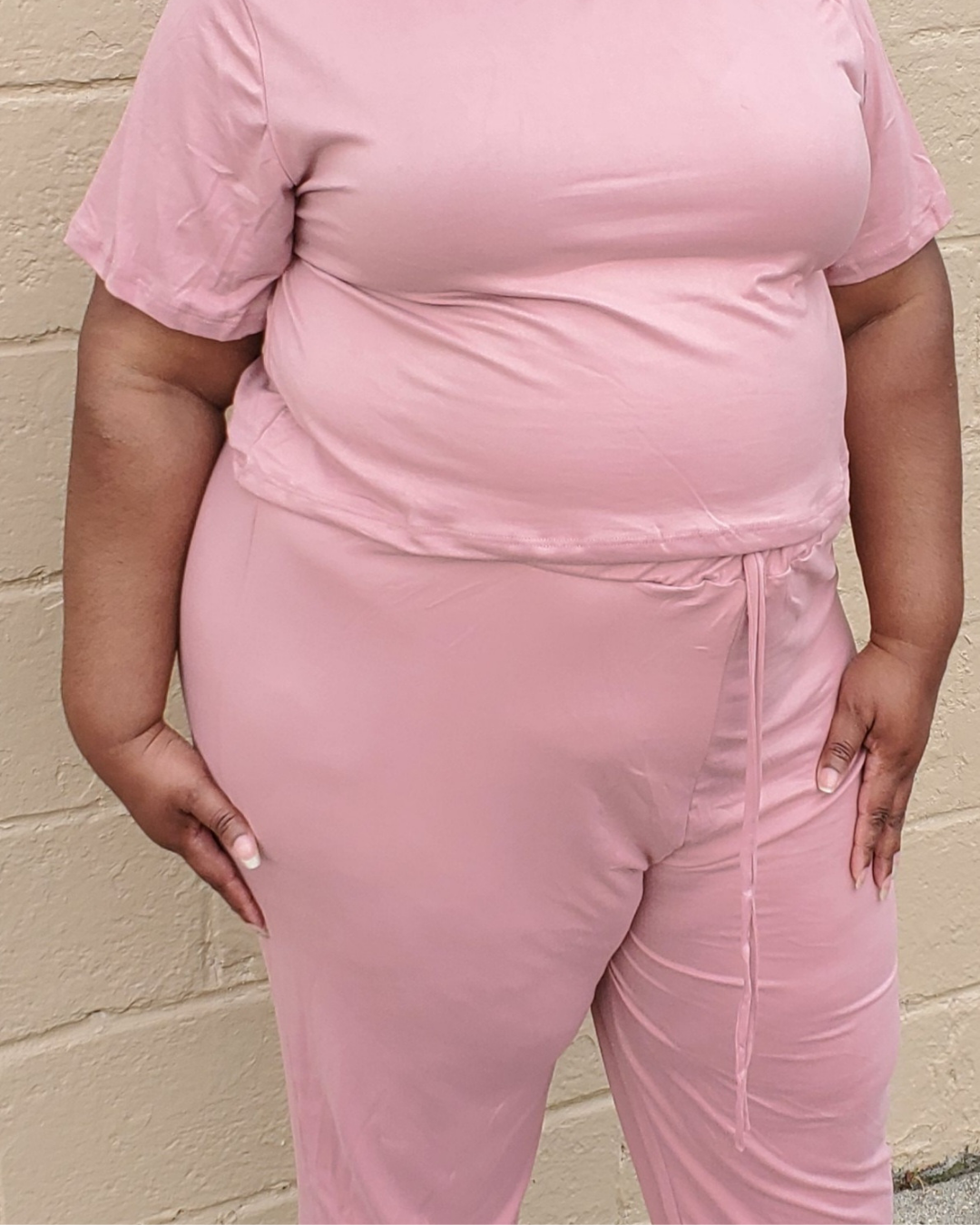 fan favorite. 1x-3x pink soft material 2 pc short sleeve shirt and loose-fitting pains with a stretch. has a jogger look at the bottom of the pants